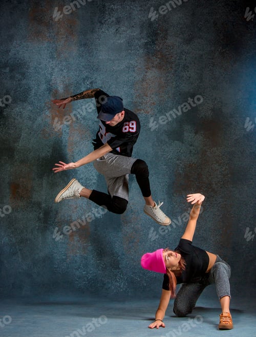 Preview: The two young girl and boy dancing hip hop in the studio