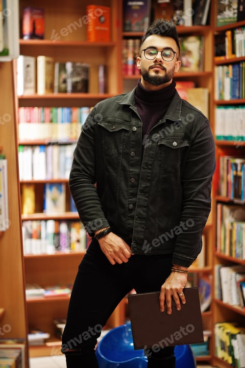 Preview: Arab student man at library