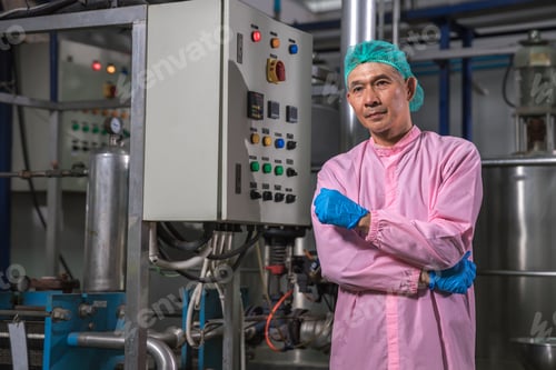 Preview: Worker Checking quality or checking stock of glass bottle in beverage factory.