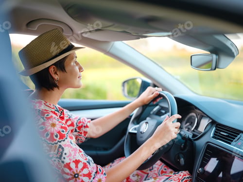 Preview: Traveler woman drives car through scenic countryside of Croatia