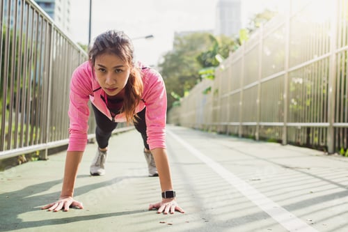 Preview: Fitness sport girl fashion sportswear doing yoga fitness exercise in street.