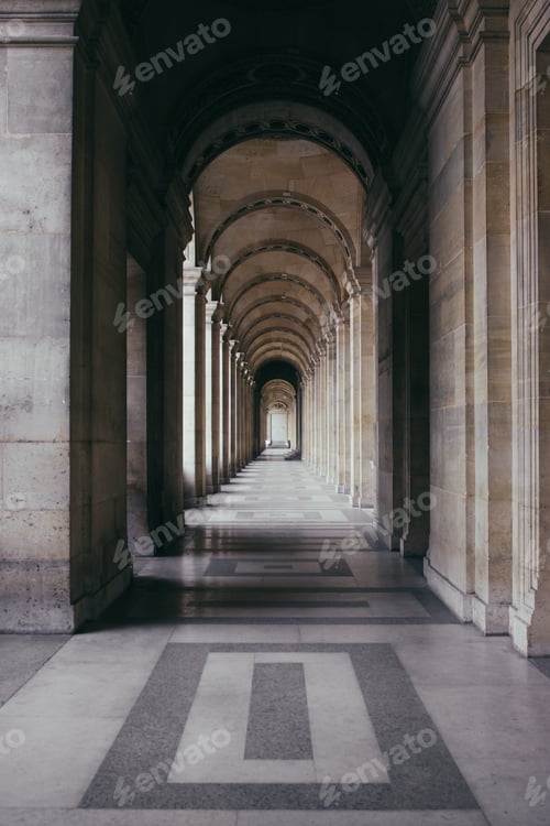 Preview: Vertical shot of an outdoor hallway of a historic building with outstanding architecture