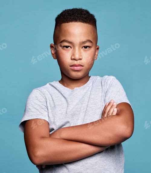 Preview: Problem, crossed arms and portrait of child with angry facial expression, attitude and upset over co