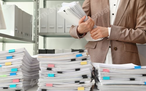 Preview: Female worker with documents in archive, closeup