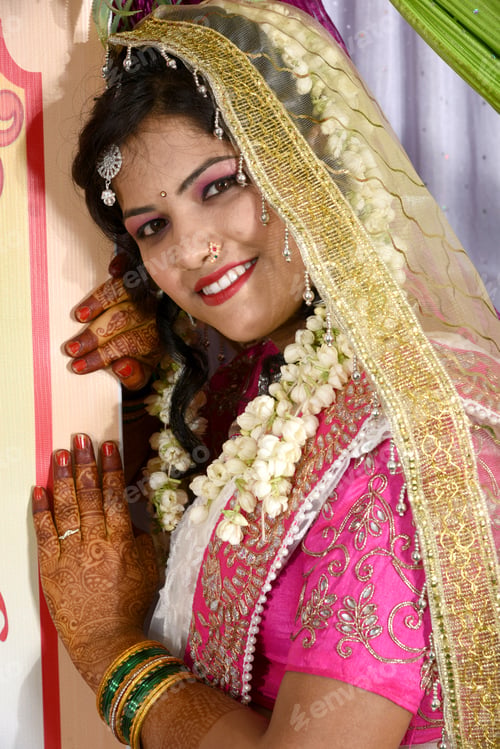Preview: Indian bride wearing traditional wedding cloths in marriage ceremony.