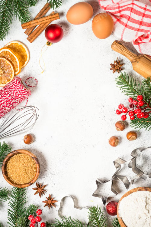 Preview: Christmas baking background on white table.
