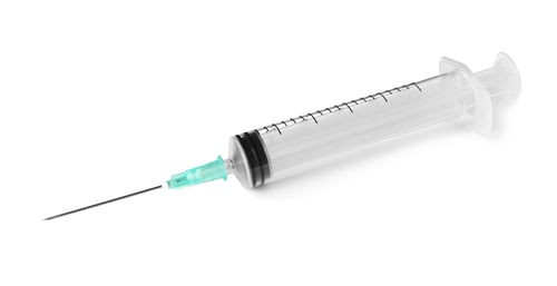 Preview: Plastic syringe on white background. Medical instrument