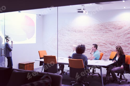 Preview: Startup Business Team At A Meeting at modern night office buildi