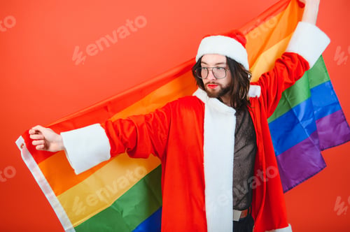 Preview: Handsome young man with pride movement LGBT Rainbow flag