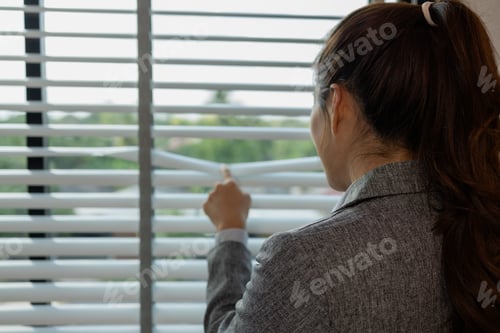 Preview: a female employee is working in an office, a businesswoman is handling urgent financial matters