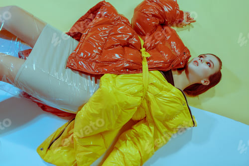 Preview: Art Fashion Portrait Of A Beautiful Girl With Makeup In A Colored Jacket In The Studio