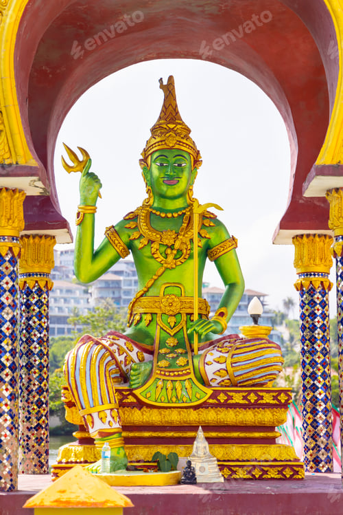 Preview: Traditional Thai Statue in a Colorful Temple Setting