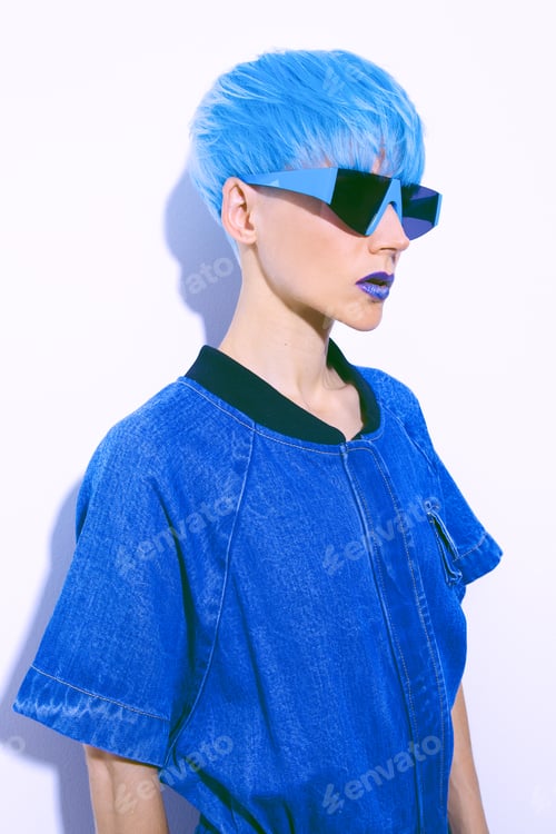 Preview: Fashion Girl with blue short hair. Trendy colours hair style concept
