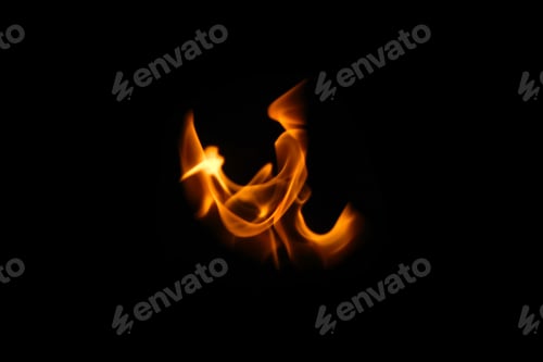 Preview: One wing in flame. Wings in Flame and Fire. Black background. Copy space. Out of focus.
