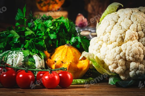 Preview: Cooking background, autumn food: tomatoes, pumpkins, cauliflower, herbs and spice