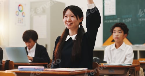 Preview: Girl, raised hand and question in classroom for smile, education and excited with problem solving f