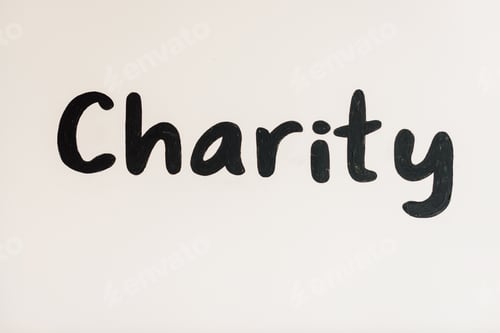 Preview: black handwritten charity inscription on white with copy space