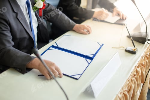 Preview: Business man signing a contract. space of paper for you edit.