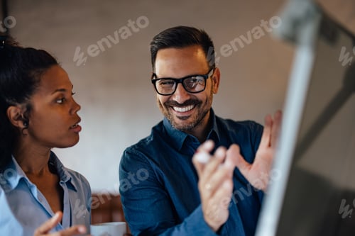 Preview: Confident Professionals Collaborating During Engaging Business Presentation and Discussion