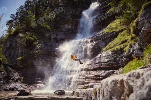 Preview: Man rappelling waterfall, Ehrwald, Tyrol, Austria