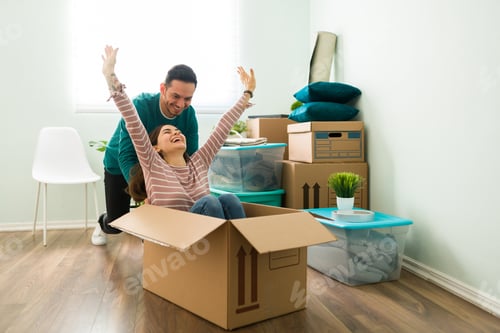 Preview: Boyfriend and girlfriend playing with a box after moving in