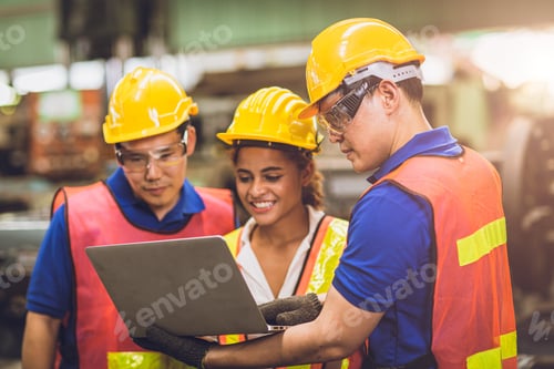 Preview: engineer team mix race brainstorming join working together in heavy industry with laptop computer di