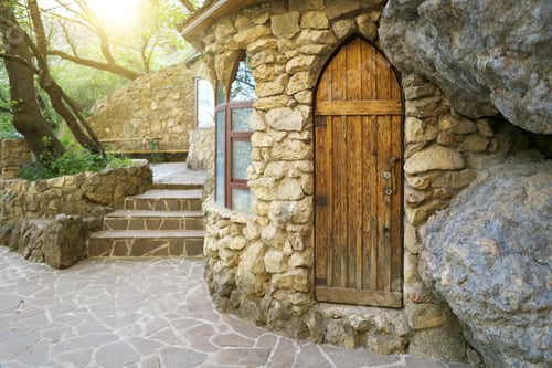 Preview: Old house door in forest.