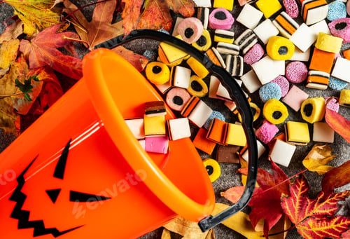 Preview: Trick or Treat Pumpkin bucket on side for collecting candy on Halloween