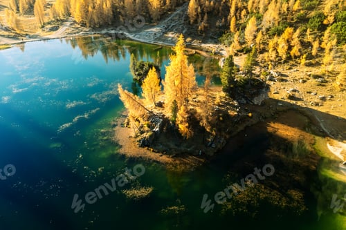 Preview: Drone flight under Federa Lake in sunrise time