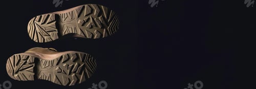 Preview: Bottom of shoes, isolated on black background.