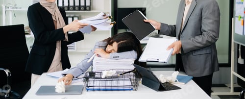 Preview: Furious Asian businesspeople arguing strongly after making a mistake at work in office