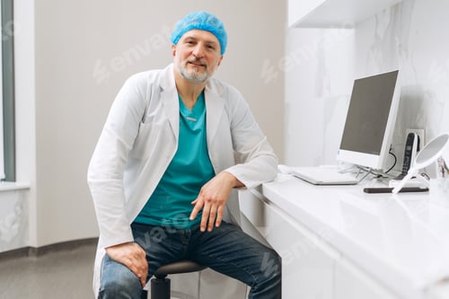 Preview: Portrait of mature dentist doctor in uniform, sitting in modern dentist office