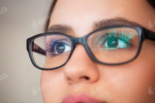 Preview: Charming woman in glasses looking away
