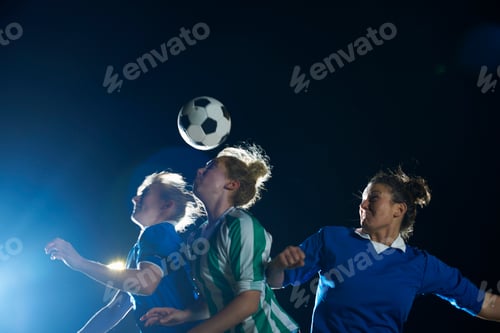Preview: Female soccer players hitting ball with head