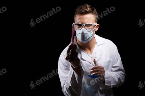 Preview: Scientist Holding Vials with Colorful Liquids