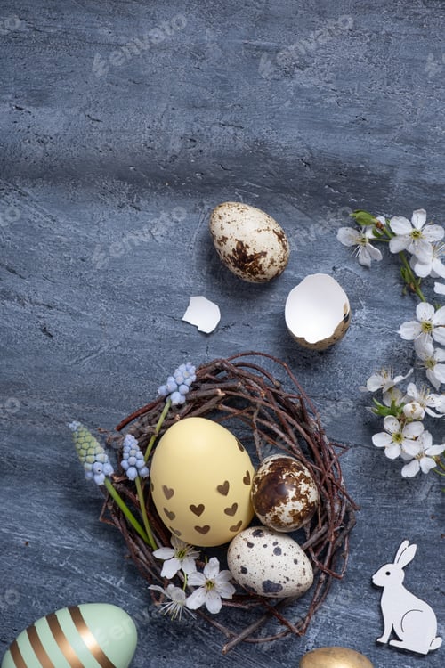 Preview: Easter composition with nest, white rabbit and eggs flat lay, top view.