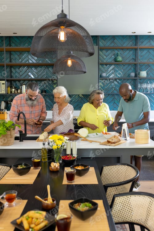 Preview: Diverse senior friends cooking together at home