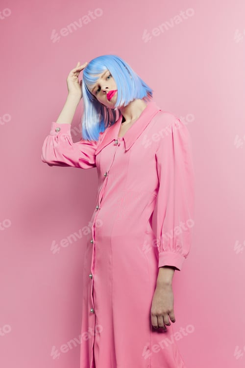 Preview: glamorous woman in blue wig pink dress red lips Lifestyle posing