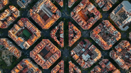 Vista previa: Aerial view of typical buildings of Barcelona cityscape. Eixample residential famous urban grid