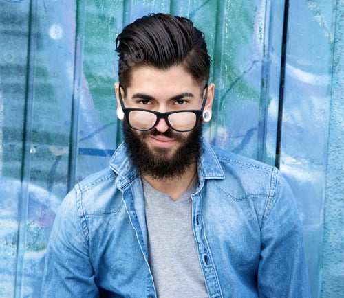 Preview: Young man with beard and glasses