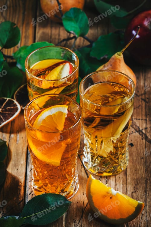 Preview: Cider glasses: apple, pear and orange drinks. Fermented low alcohol fruit cocktails