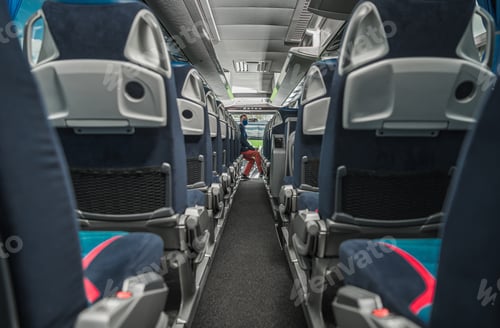 Preview: Shuttle Bus Driver Awaiting Passengers Inside the Vehicle During Virus Outbreak