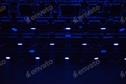 Preview: Stage lights glowing in the dark. Live music festival concept background