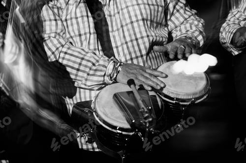 Preview: musician playing drums in in the night club
