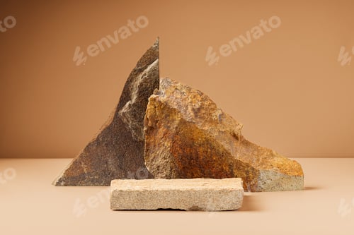 Preview: Piece of granite stone against beige background with shadows