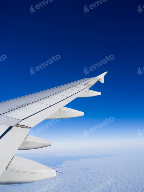 Preview: airplane flying above the clouds