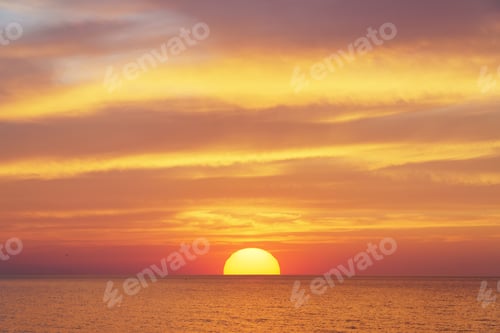 Preview: Big sun and sea sunset background.