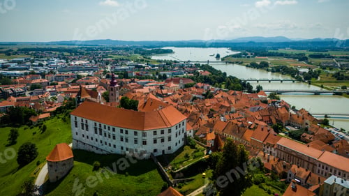 Preview: Aerial drone view of Ptuj townscape in Slovenia by river Drava
