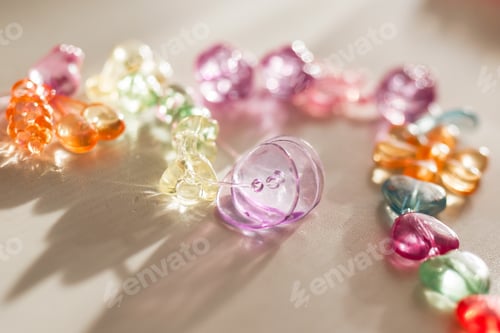 Preview: Colorful Beads and Buttons on a White Surface in Sunlight, Crafts of Children and Jewelry Making.