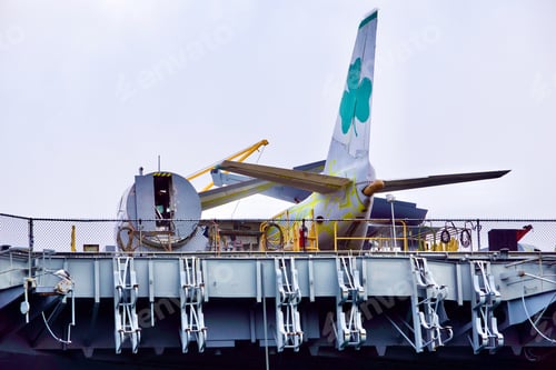 Preview: United States Navy airplane on top of an aircraft carrier ship that is now a museum attraction